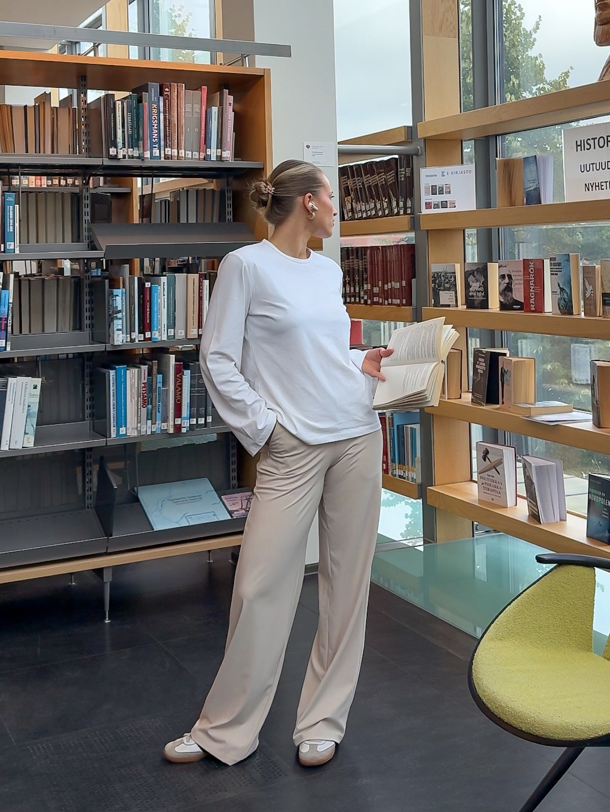 Woman wearing Ninepine Asana Relaxed Pant in Beige paired with a Pima Long Sleeve for an effortless neutral look.